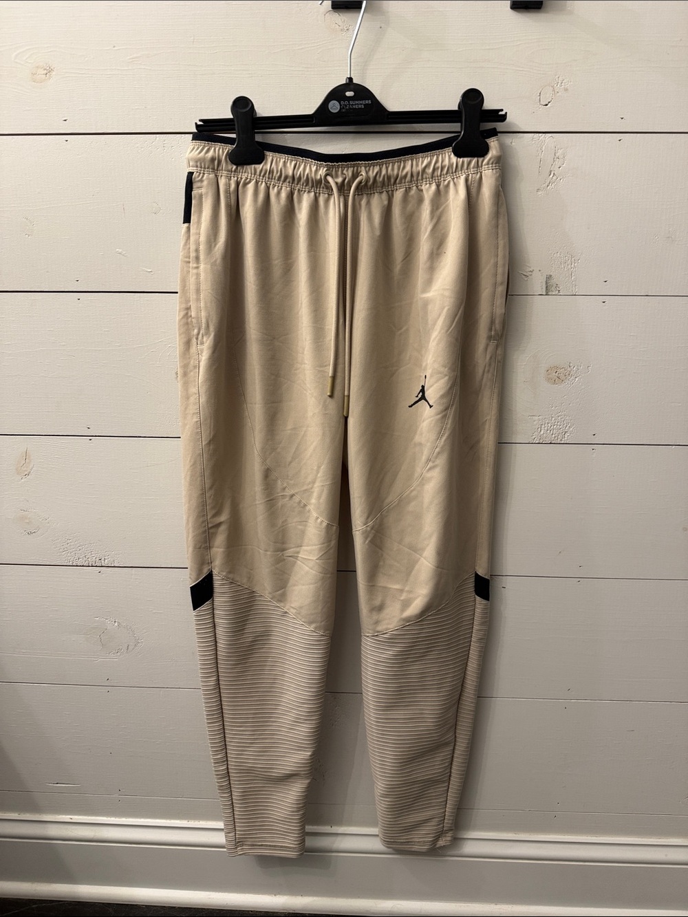 Jordan Men’s Cream Jogger Pants with Black Jumpman Accents